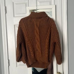 Nice brown turtleneck sweater!